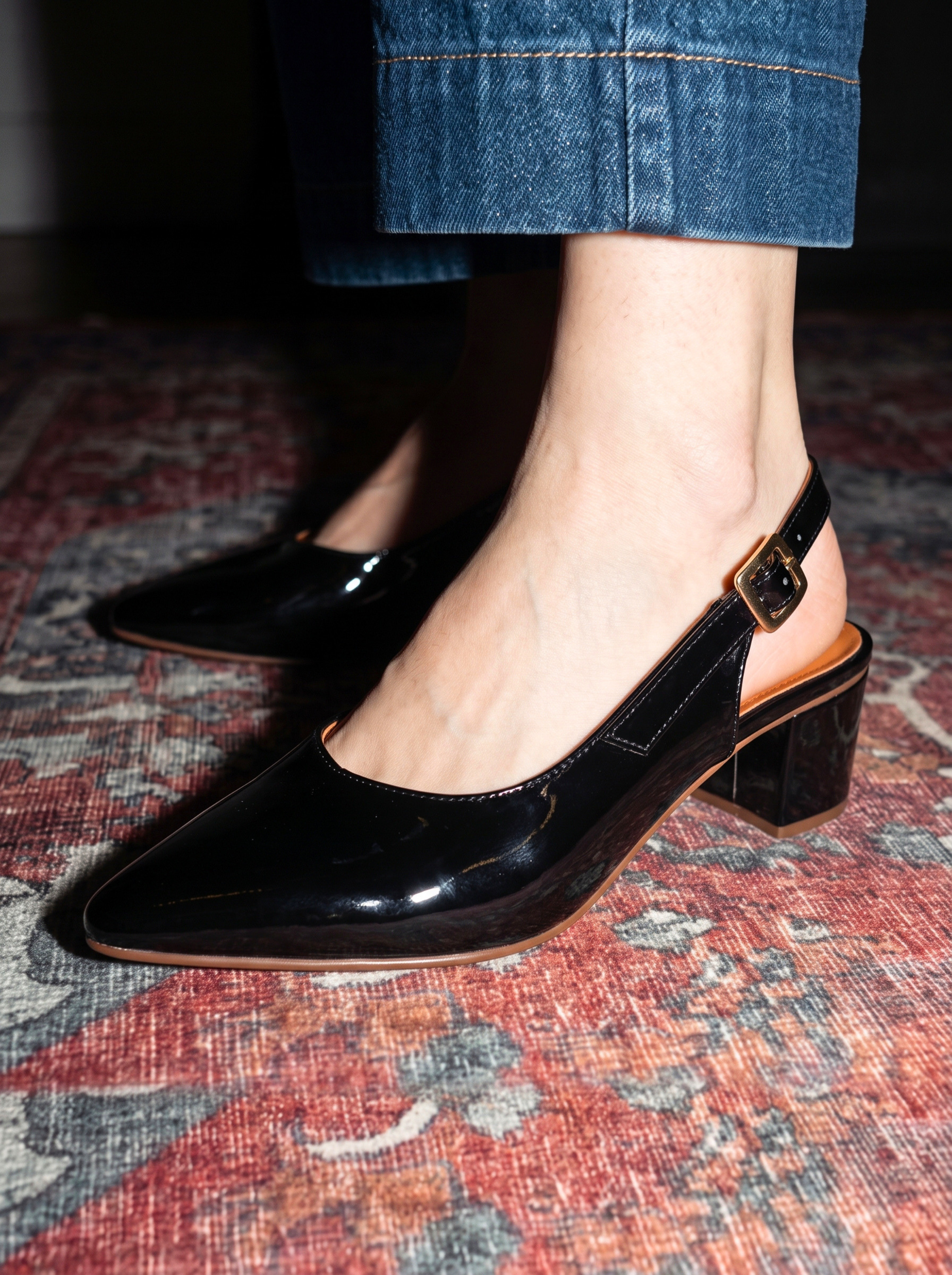 Black patent slingback block heels with pointed toe and adjustable strap by SAWA Shoes