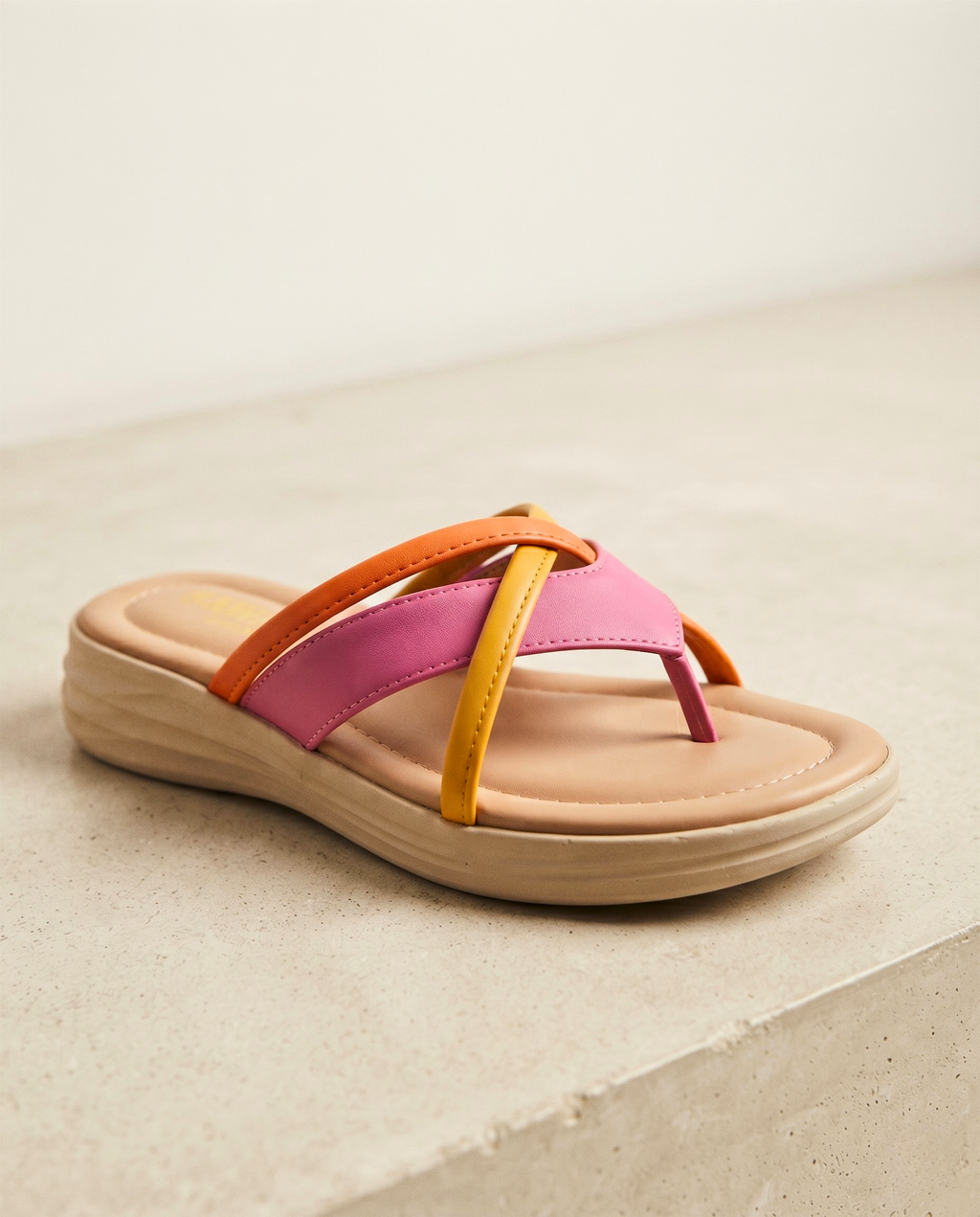 Women's Candy Comfort Slides with pink, orange and yellow criss-cross straps, cushioned footbed and lightweight sole for everyday casual wear