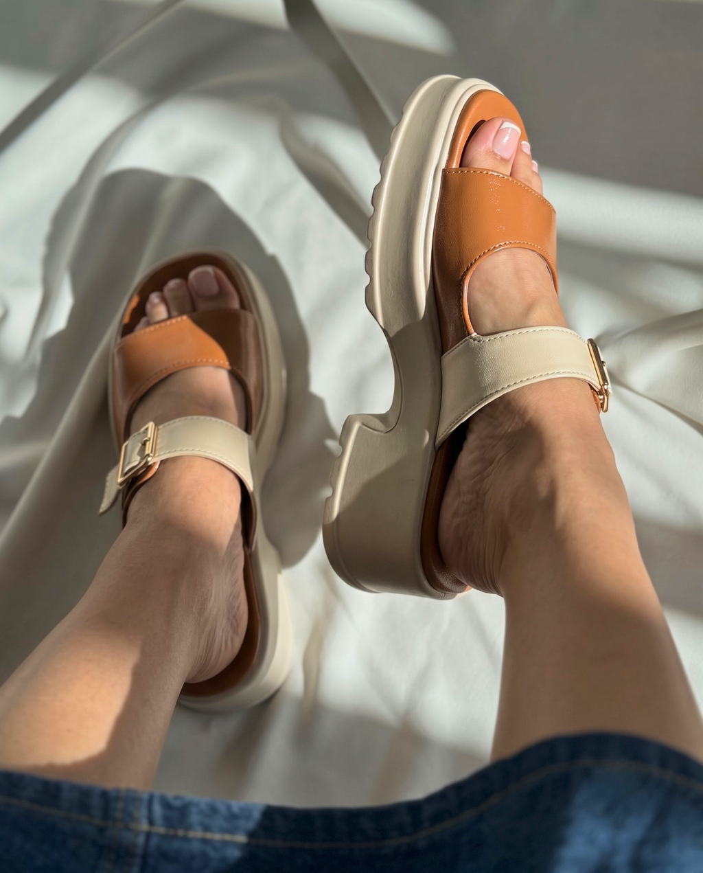 Women's tan comfort platform sandals with adjustable cream buckle strap and lightweight chunky sole