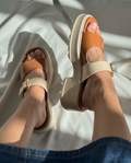 Women's tan comfort platform sandals with adjustable cream buckle strap and lightweight chunky sole