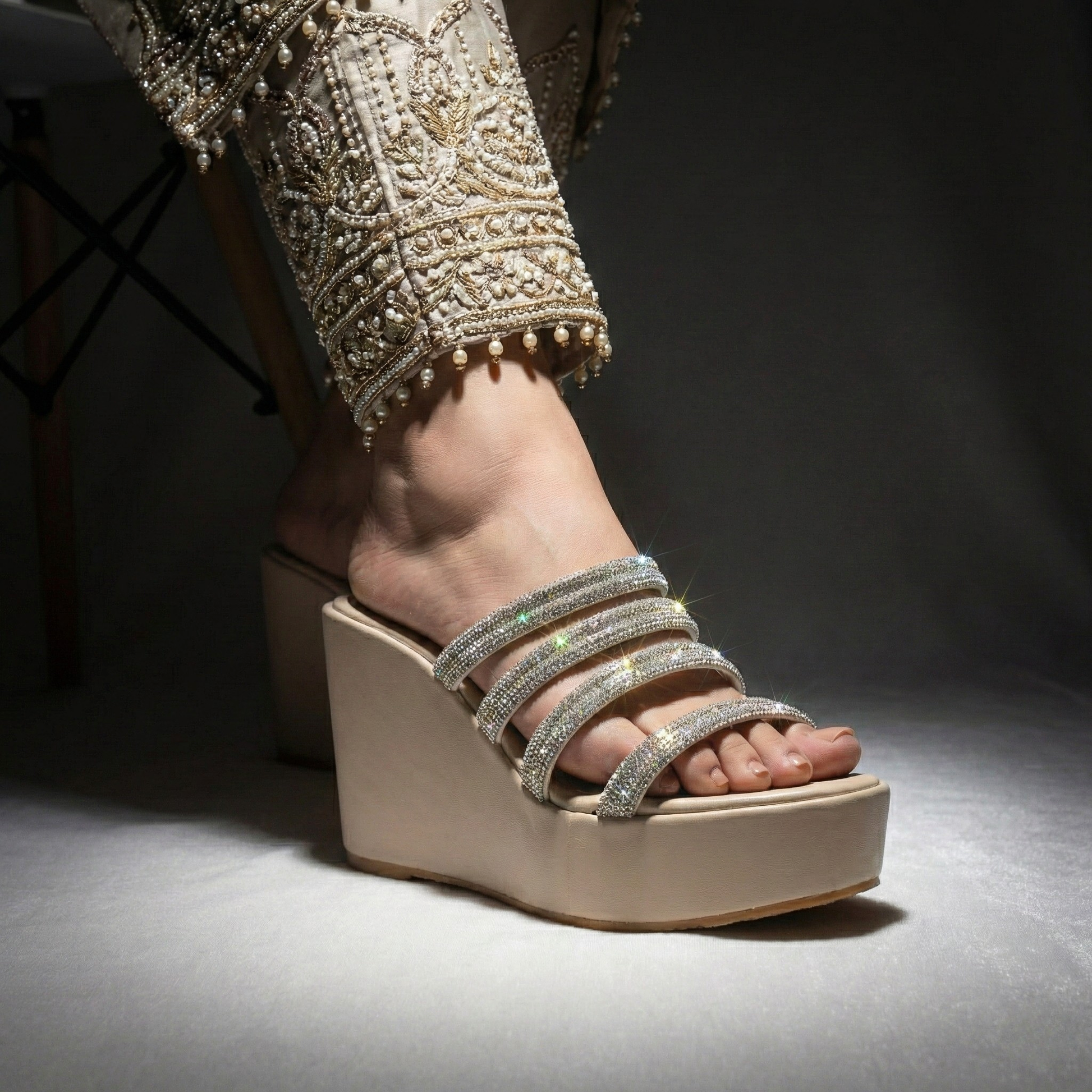 Silver platform wedges with rhinestone straps for Pakistani weddings.