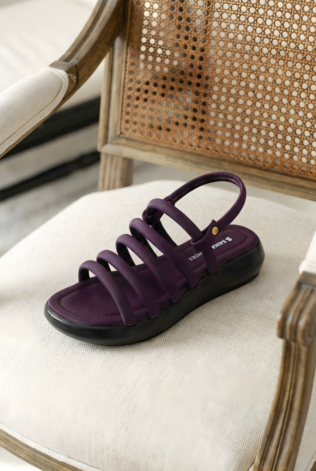 Sawa Shoes purple puffy sandals side view showing cushioned straps and back support strap