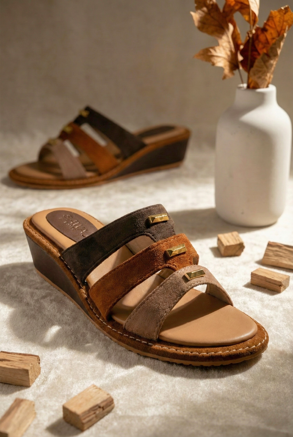 Brown tri-color suede wedge sandals for women with gold studs on a neutral aesthetic background - Sawa.pk footwear.