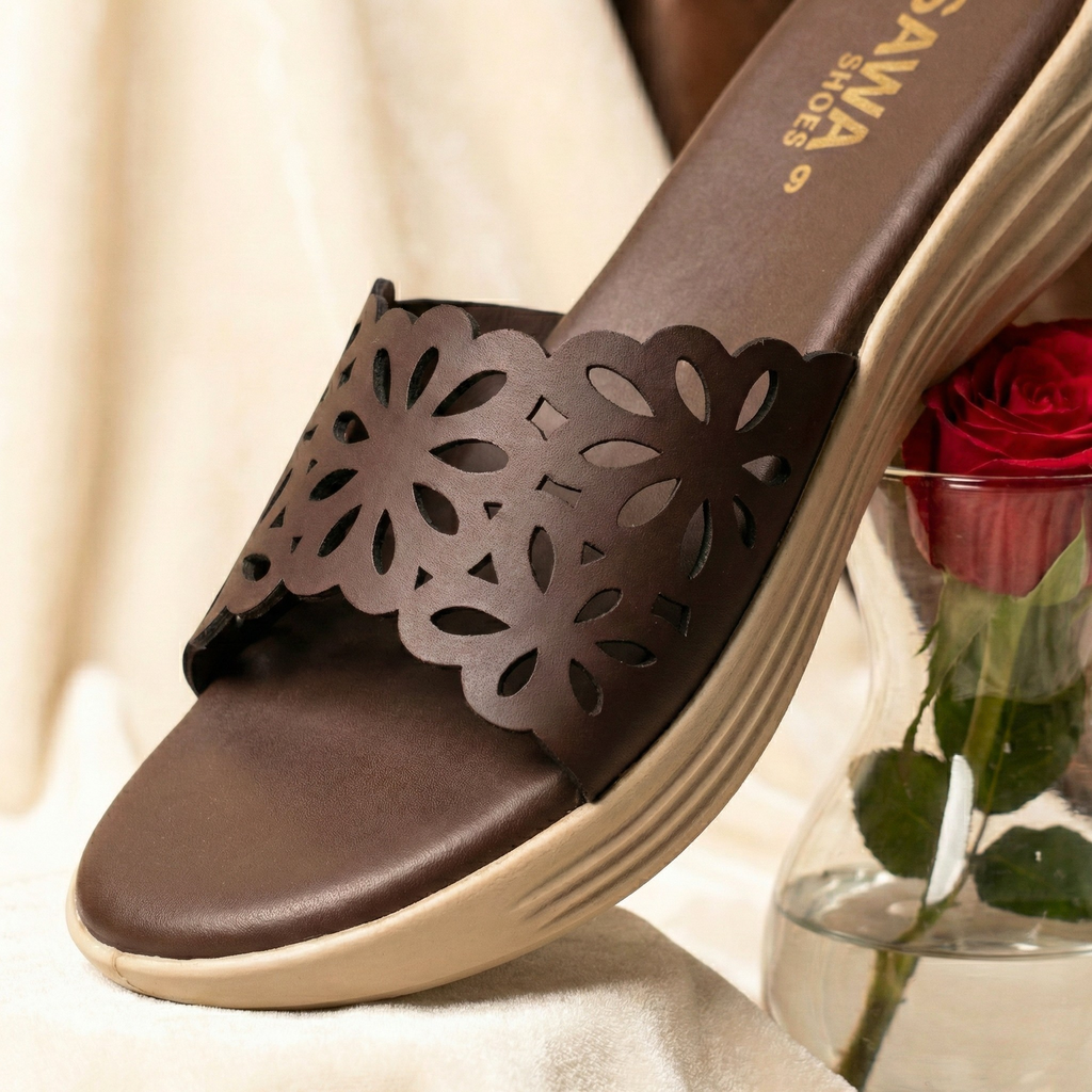 Cocoa brown floral comfort slippers for women with laser-cut straps and cushioned cream soles by Sawa Shoes Pakistan.