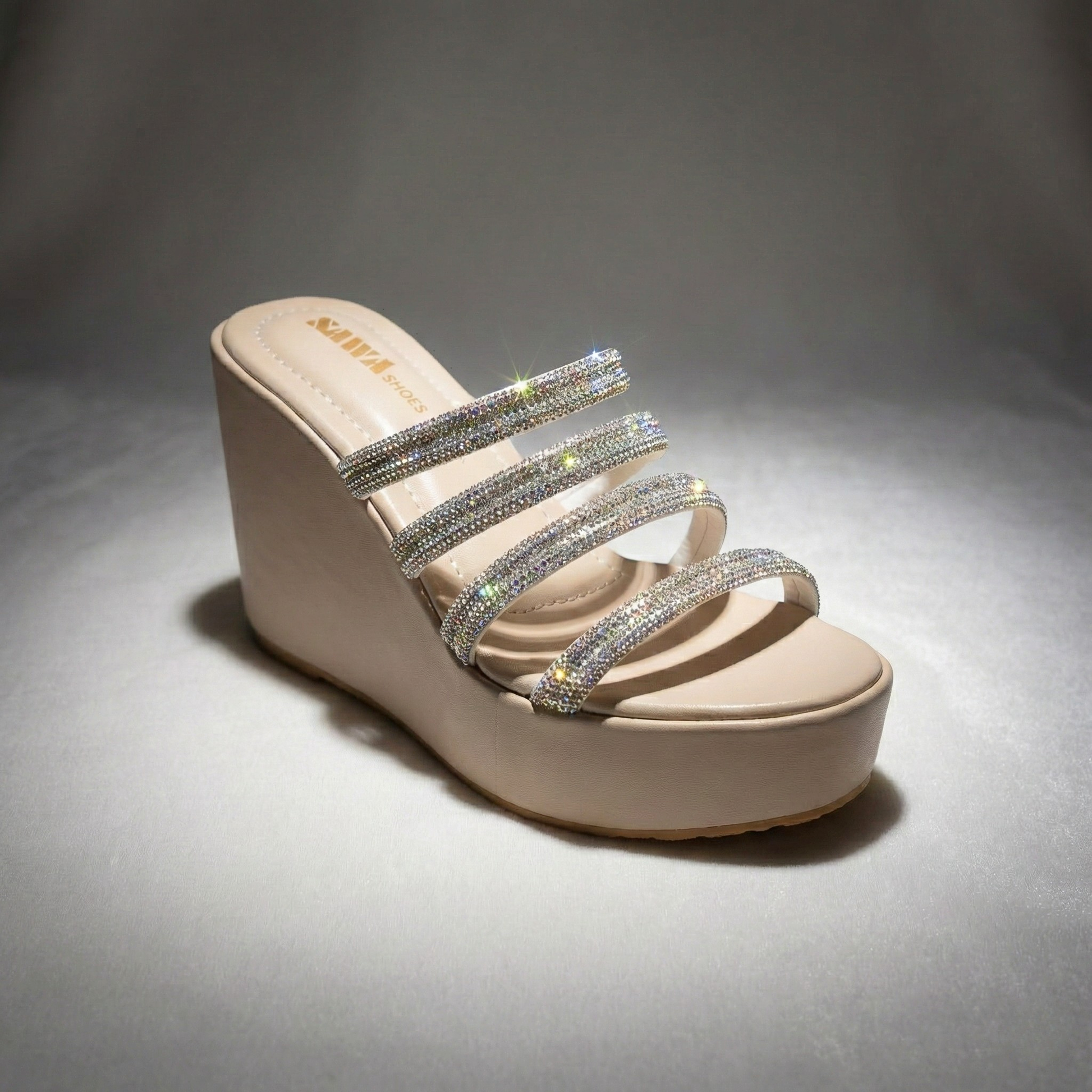Silver platform wedges with rhinestone straps for Pakistani weddings.