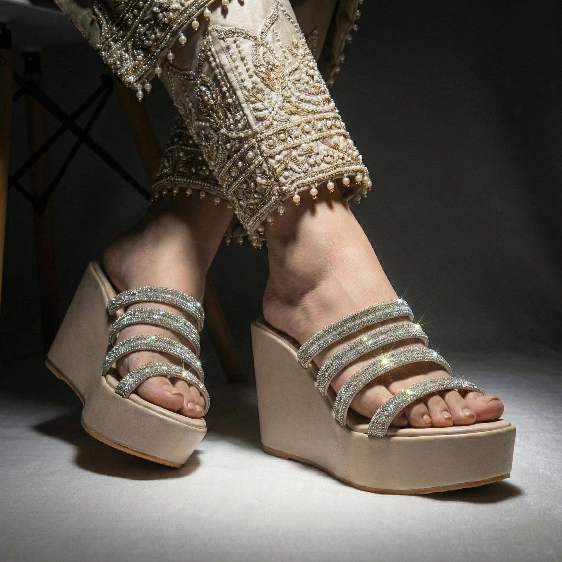 Silver platform wedges with rhinestone straps for Pakistani weddings.