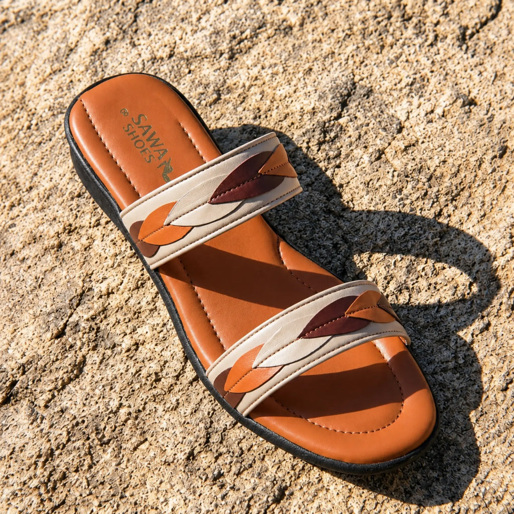 Leaf braid casual slipper angled view, padded tan footbed