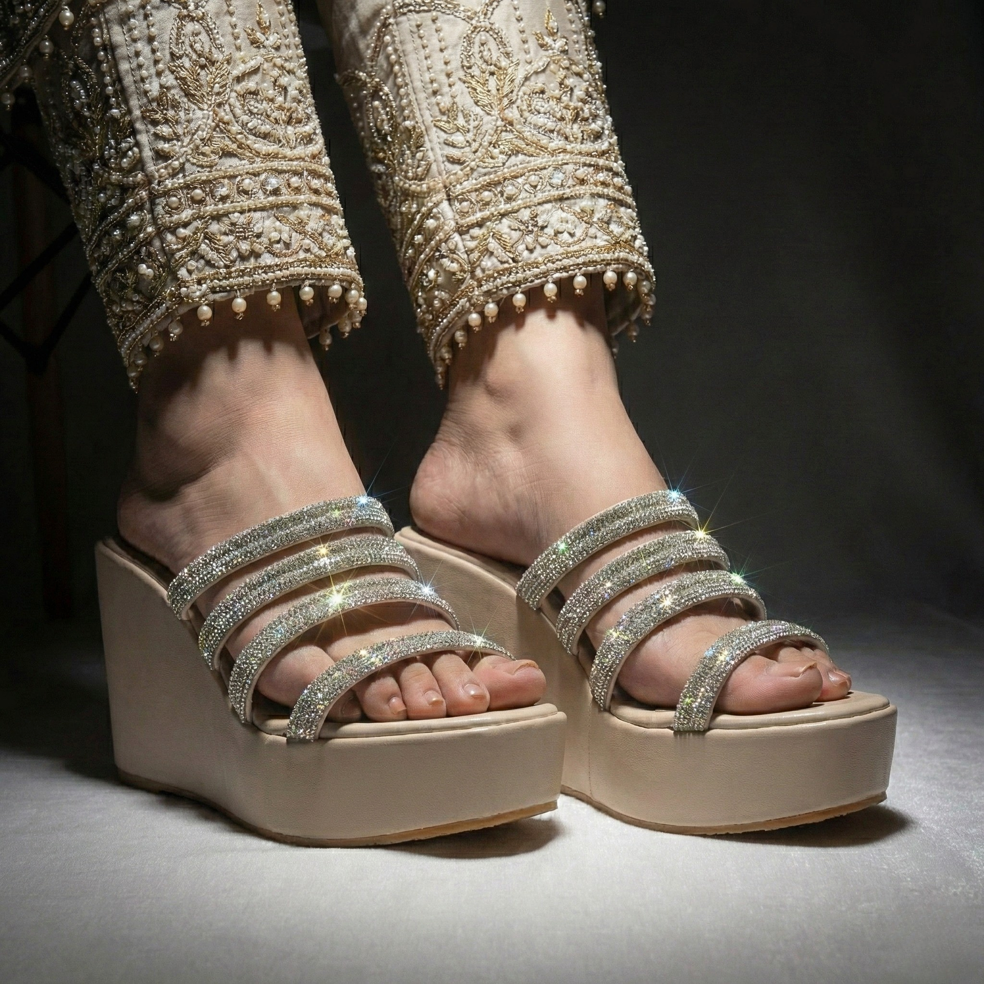 Silver platform wedges with rhinestone straps for Pakistani weddings.