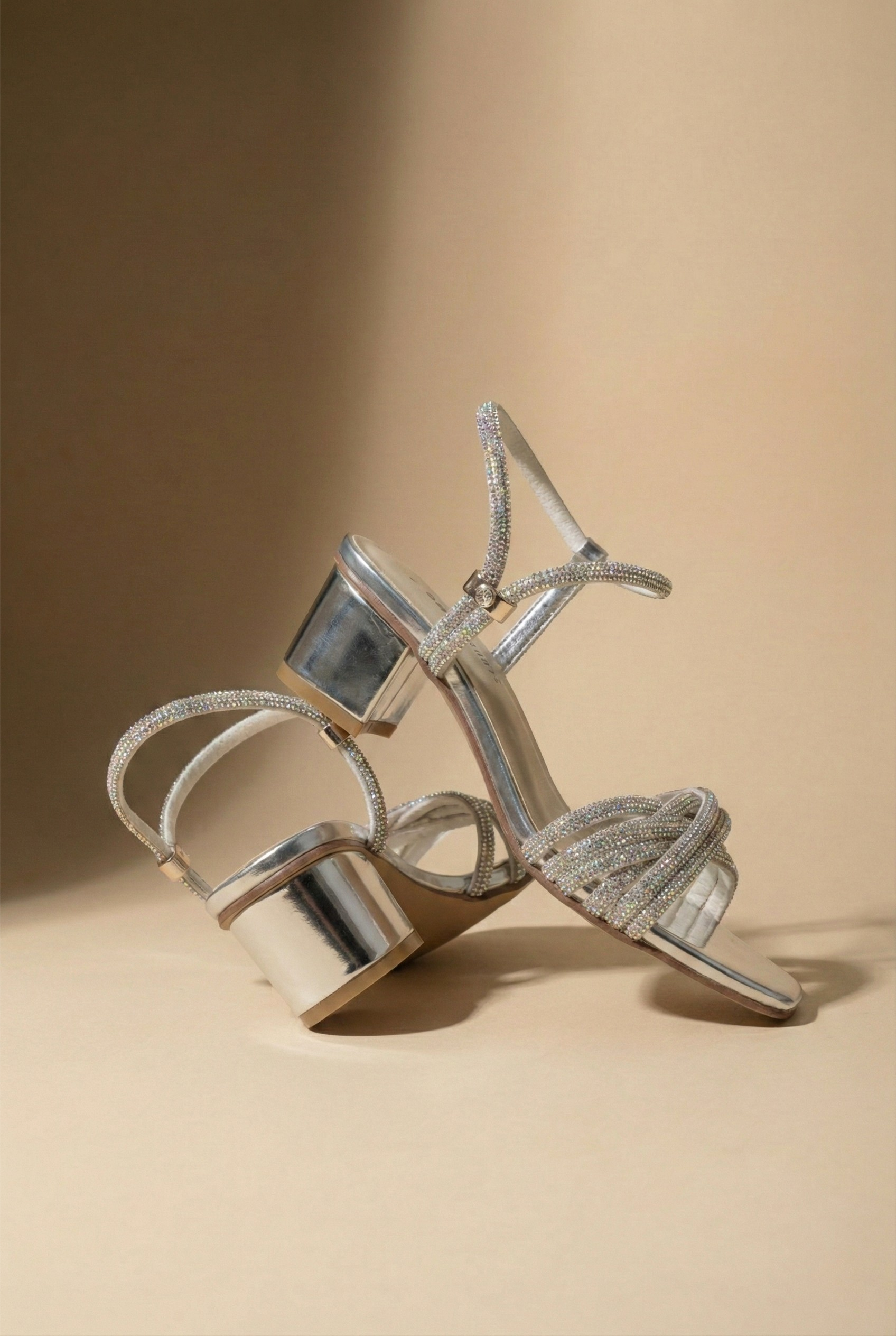 Close-up of Luna silver block heel sandals showing 2-inch heel, square toe, and SAWA SHOES branding