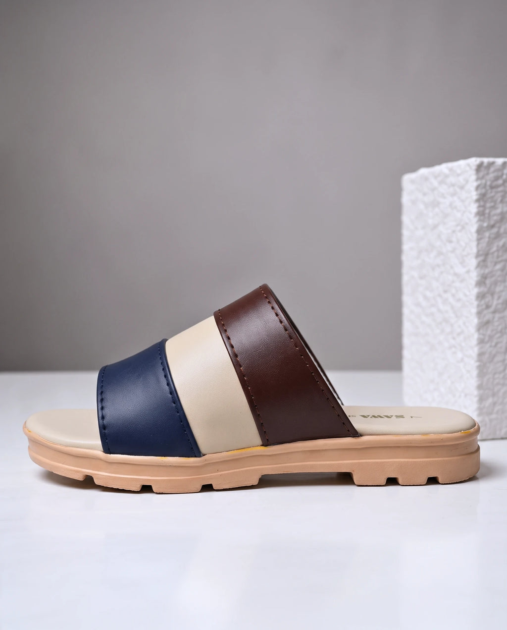 Side view of colorblock casual slide with lug sole