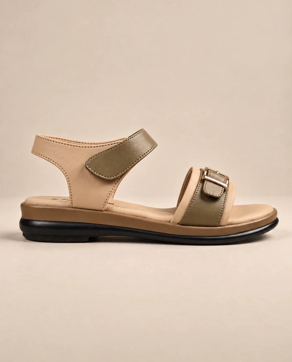 Side view of beige and olive buckle sandal with adjustable ankle strap
