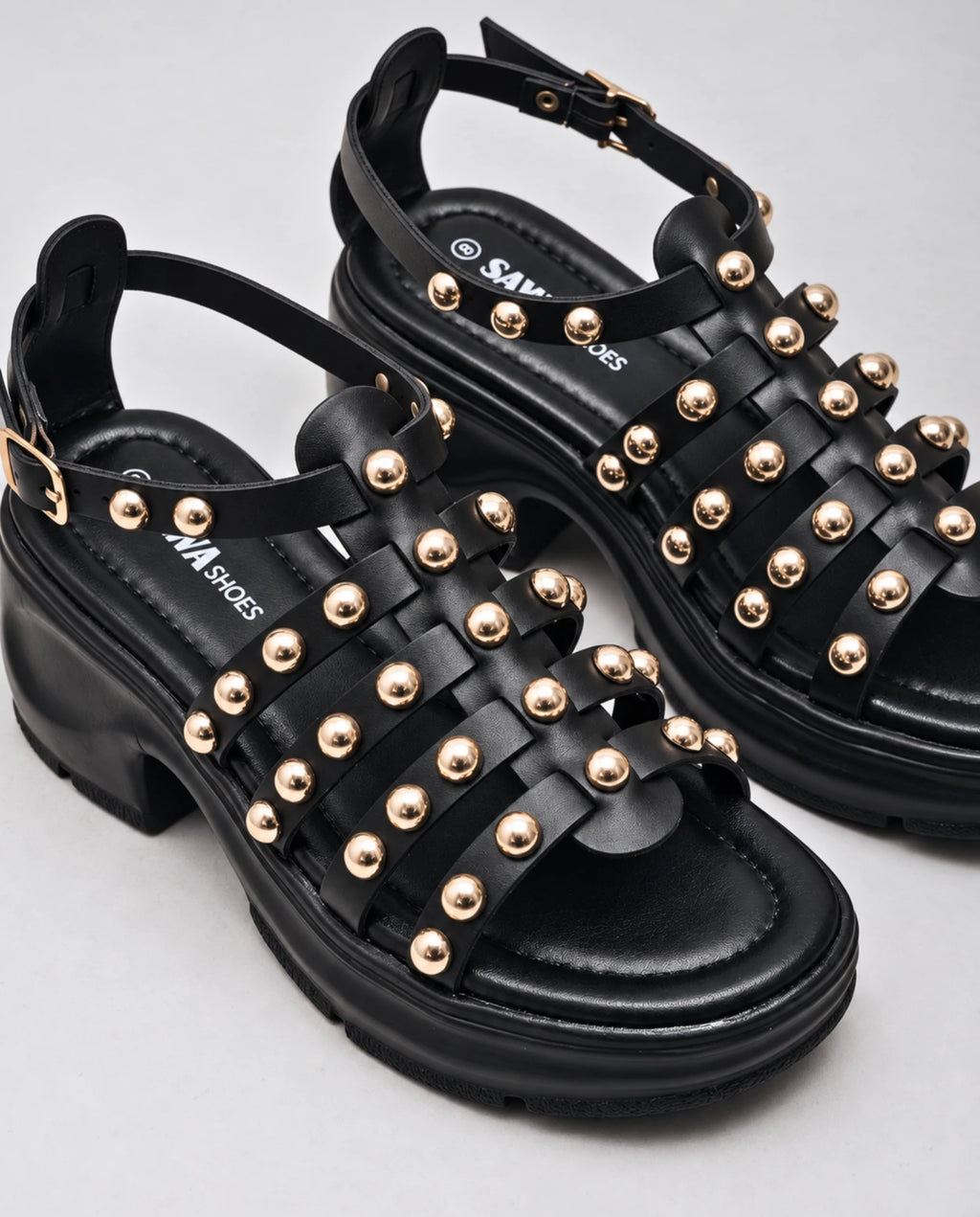 W706 BK gold stud detail close-up on black straps | Sawa.pk