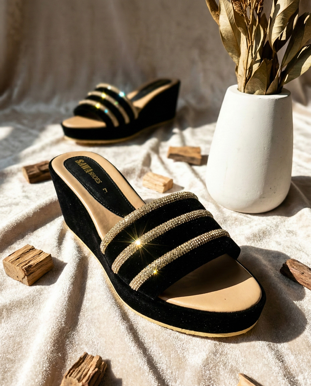 A pair of SAWA SHOES black velvet wedge platform sandals, perfect for Pakistani wedding wear and festive occasions