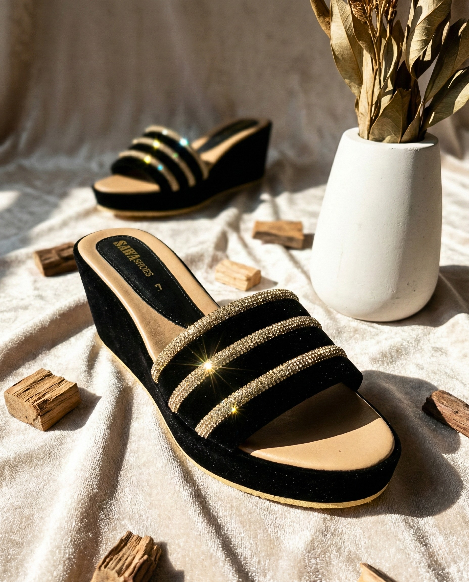 A pair of SAWA SHOES black velvet wedge platform sandals, perfect for Pakistani wedding wear and festive occasions